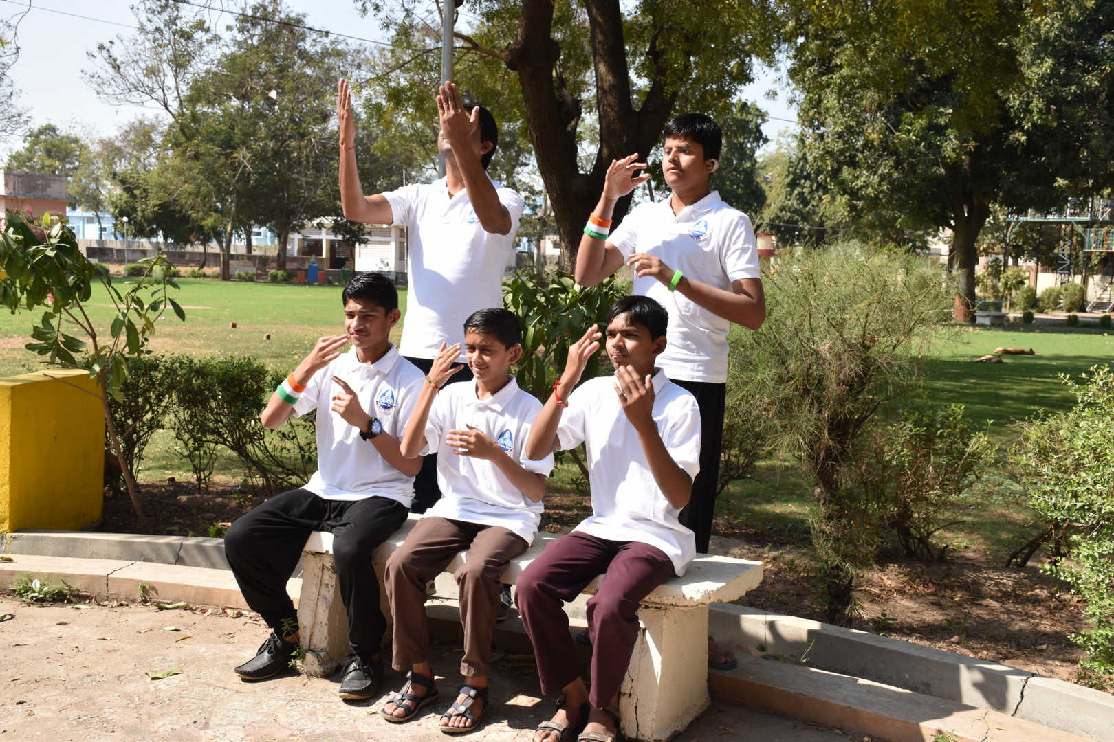 Boys performing video album inspirational songs in sign language